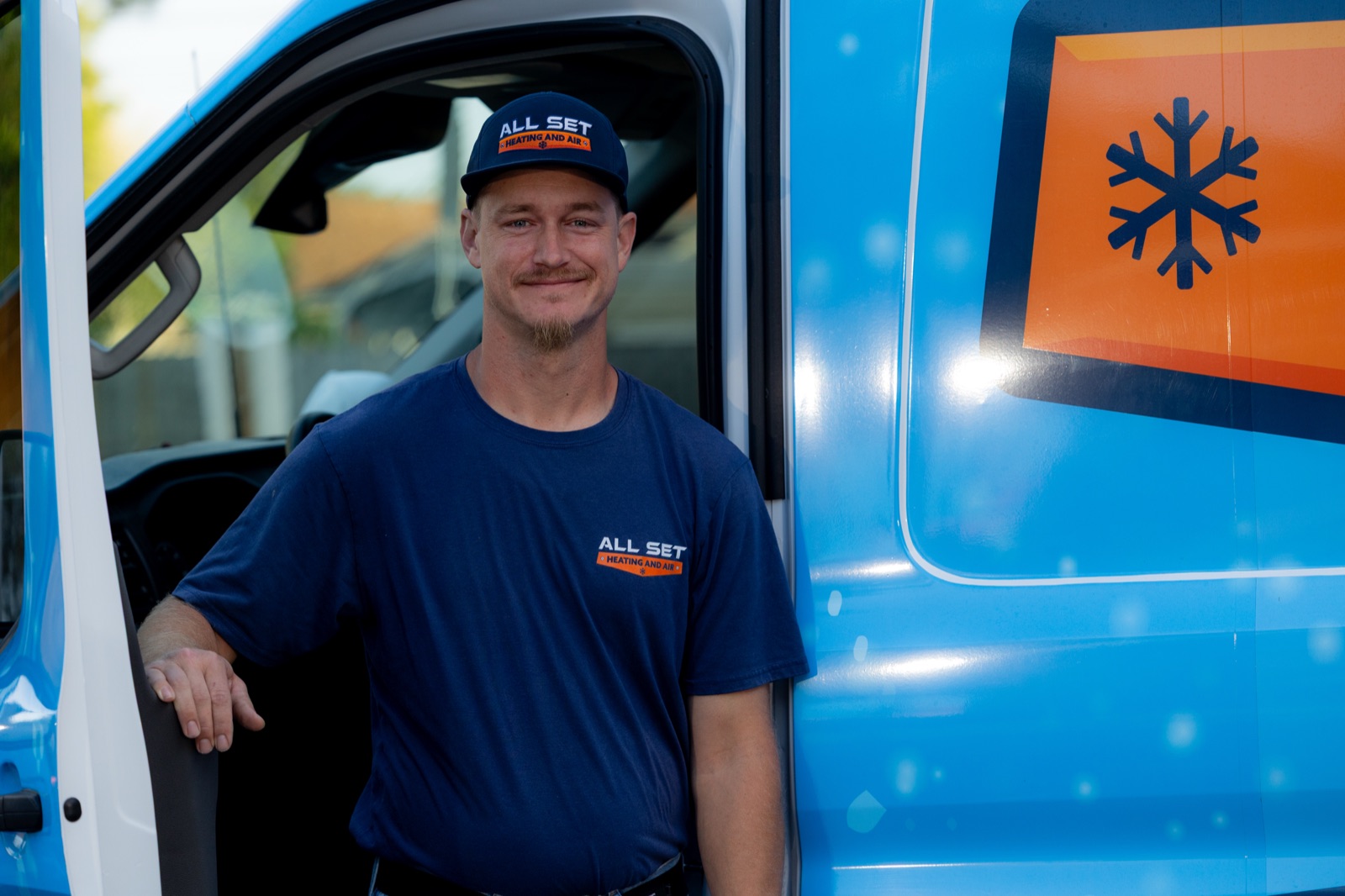 All Set team member with a fully stocked service van